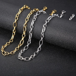 Macro shot of gold and silver titanium steel O-chains with detailed vintage textures