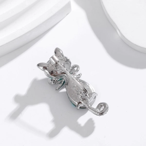 Cute silver cat brooch with green crystals and secure rotating safety pin clasp back