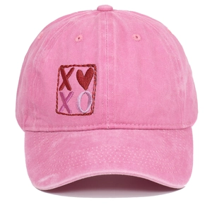 Pink washed cotton baseball cap featuring vintage XOXO heart embroidery on front