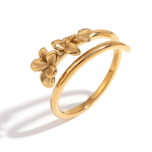 Double-layered 18K gold plated stainless steel open ring with floral motif on white background