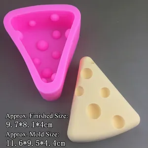 Detailed size view of pink cheese-shaped silicone mold with finished resin candle