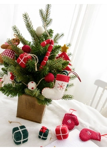 Mini wool felt Christmas tree ornaments including gingerbread man and candy cane in gold pot