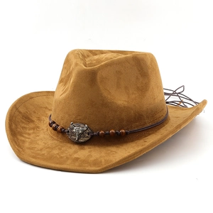 Brown western cowboy felt hat featuring vintage metal bull head and beaded band decor