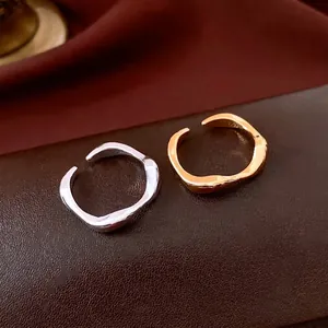 Minimalist 18k gold plated irregular wave open rings in gold and silver finish