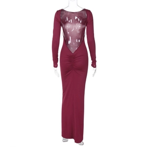 Detail of the backless ruched design and waist folds on this burgundy long sleeve dress