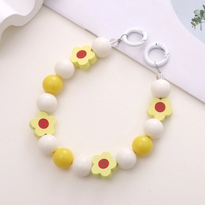 Handmade wooden flower beaded phone charm with yellow sunflowers and round beads
