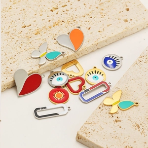 Colorful enamel heart and butterfly charms in gold and silver for DIY jewelry making