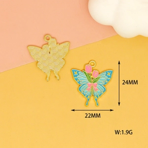 Detailed macro of 24mm sky blue butterfly enamel pendants with pink tulip patterns