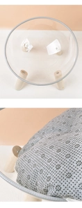 Close-up of the anti-slip fabric cushion with floral patterns for the clear acrylic cat bed