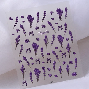 Detailed macro view of 5D lavender flower nail art stickers with purple bow designs
