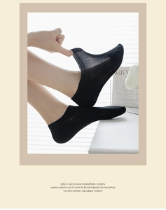 Elastic black bamboo fiber invisible sock showing stretchable breathable knit texture