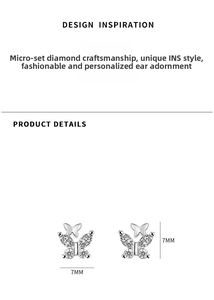 Detail macro view of 7mm silver butterfly studs with micro-paved cubic zirconia stones