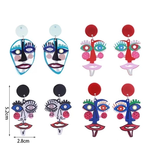 Abstract acrylic face earrings in pop art style showing dimensions of 5.2cm by 2.8cm