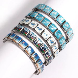Detail of Italian stretch link bracelet with nautical marine life enamel patterns