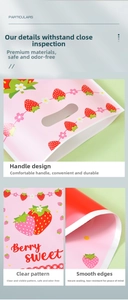 Detail of pink strawberry gift bag featuring Berry Sweet print and handle hole cut-out