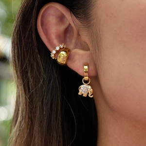 Elephant rhinestone earrings and cuff set in gold stainless steel shown on ear