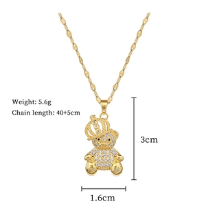 Detail view of gold bear pendant with dimensions 3cm height and 40+5cm chain length