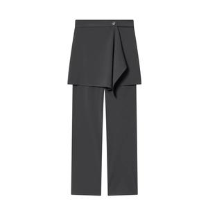 Detailed view of dark grey high-waisted trousers with asymmetrical layered skirt design