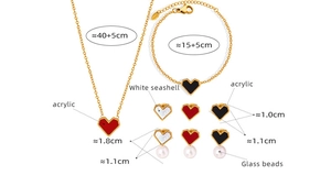 Detailed size and material guide for 18K gold heart jewelry set with white seashells