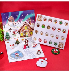 Detailed Christmas advent calendar box with 24 festive charms and jewelry accessories
