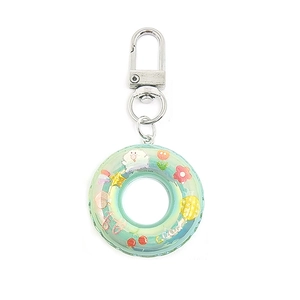 Detail of green mini swim ring keychain with cartoon animal print and lobster clasp