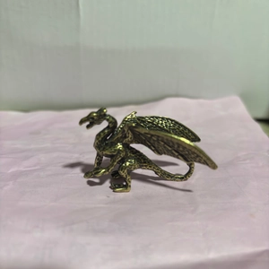 Antique brass finish winged dragon sculpture for tabletop and home decor