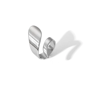 Macro shot of silver irregular geometric open ring made of polished stainless steel