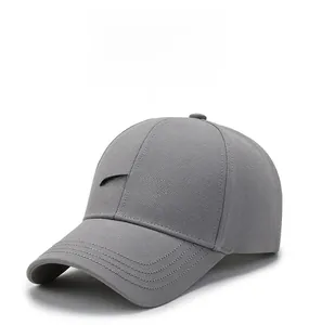 Detailed view of MSFASHION embroidery on grey baseball cap with reinforced stitching