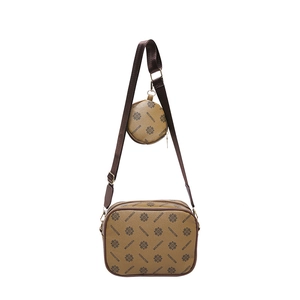 Brown monogram crossbody bag set with a small round coin purse and adjustable strap