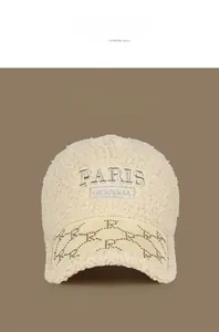 Detailed embroidery of PARIS logo and rhinestone R on warm lamb wool baseball cap
