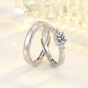 Classic silver couple rings set with round brilliant moissanite and milgrain edge details