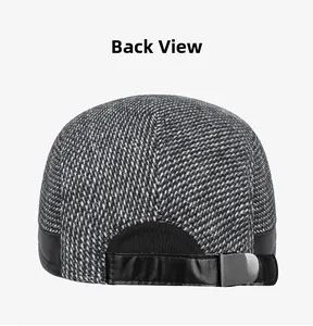 Detailed back view of wool blend newsboy cap with leather patch and adjustable metal buckle