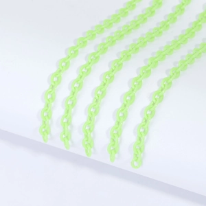 Top view of five parallel neon green acrylic chain links for DIY jewelry making