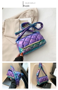 Detail view of iridescent purple quilted shoulder bag with soft metallic finish
