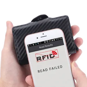 Black carbon fiber RFID blocking card holder with automatic pop-up and secure magnetic closure