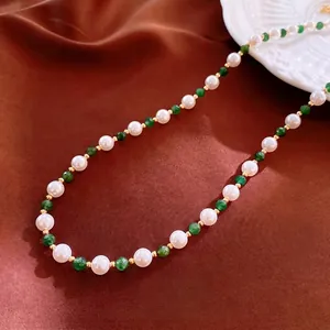 Vintage natural pearl and green gemstone beaded necklace with golden metal accents
