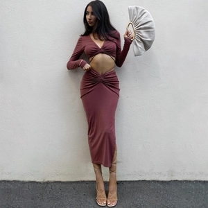 Deep dusty rose two-piece slim fit set with V-neck cropped top and high-waisted pleated skirt