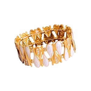 Vintage teardrop zircon gold bangle featuring white enamel inlay and sparkly rhinestones