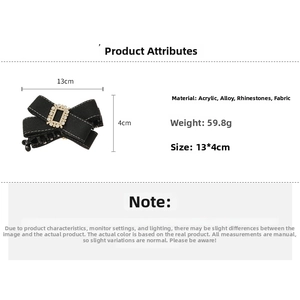 Detail specifications of black rhinestone bow hair clip with 13x4cm dimensions and 59.8g weight