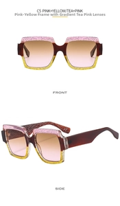 Detail view of large square color-blocked sunglasses with glitter frames and gradient lenses