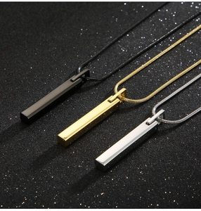 Polished bar necklaces in black, gold, and silver on a minimalist snake chain
