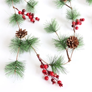 1.8m Christmas pine needle garland with red berries and natural cones on white background