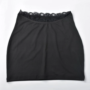 Detail of black mini skirt featuring delicate lace trim and stretch fabric on white background