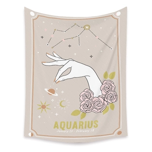 Detail of Aquarius astrology tapestry showing pink roses, gold stars, and date text