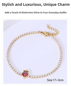 Detail of gold tennis bracelet with red heart zircon and crown pendant 17+3cm