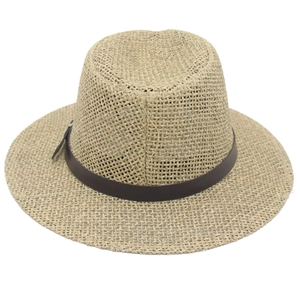 Classic straw fedora hat with dark brown leather band on white background for summer