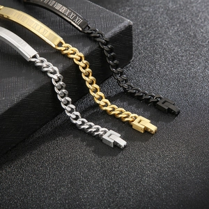 Detailed macro view of gold, black and silver stainless steel Roman numeral bracelets