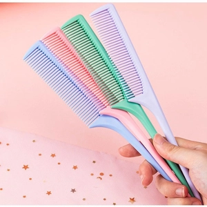 Set of four colorful plastic rat tail combs in pastel blue, pink, green, and purple colors
