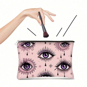 Neceser de lona rosa con estampados de ojos y detalle de cremallera metálica