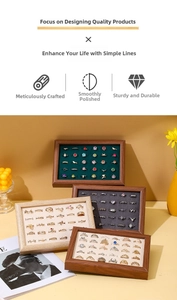 Walnut wood ring display trays with colorful velvet lining showing jewelry storage details